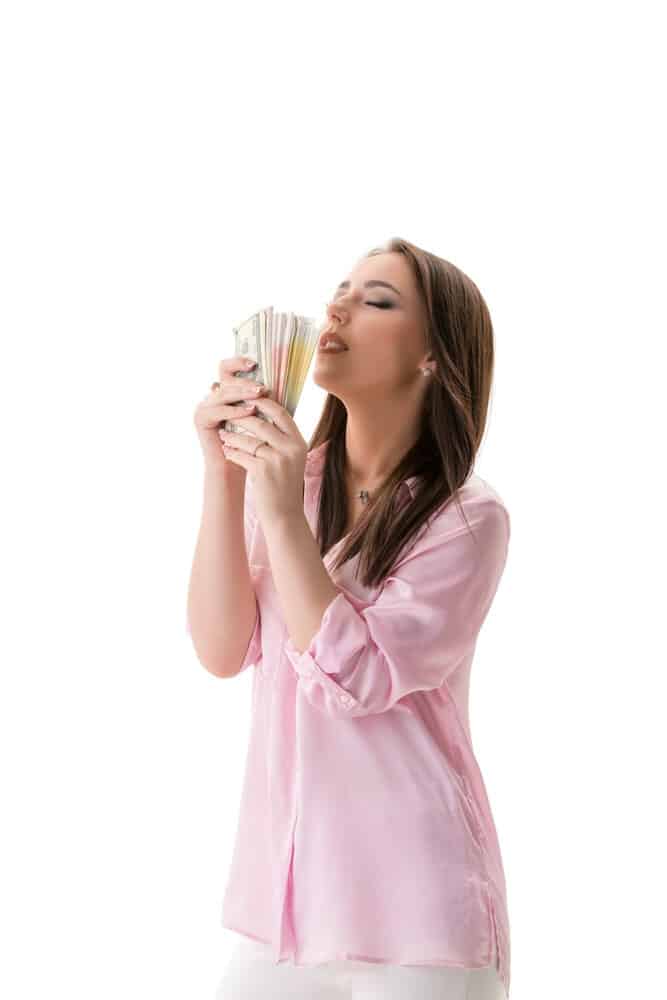mental health and Financial well-being. Woman holding money and happy