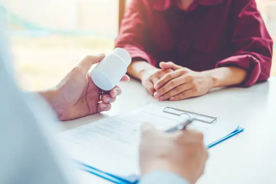 Doctor or physician recommend pills medical prescription to male Patient Doctor or physician recommend pills medical prescription to male Patient