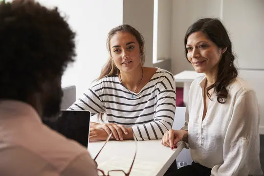 Mother And Daughter Meeting With Male Teacher Mother And Daughter Meeting With Male Teacher