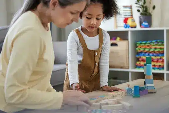 Therapist, child and development with toys for education, learning behavior and assessment for adhd Therapist, child and development with toys for education, learning behavior and assessment for adhd